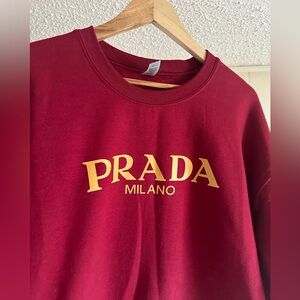 Prada sweatshirt .. unisex in great condition casual sweatshirt . Maroon color